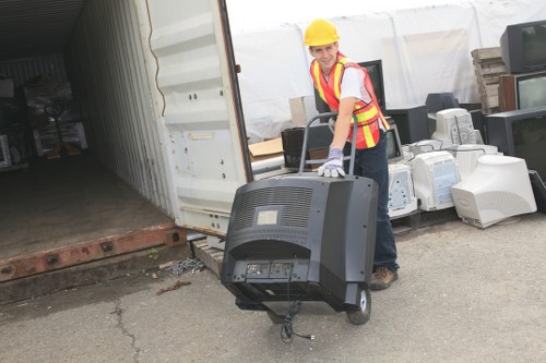 Cleanup crew organizing cleared space in Docklands home